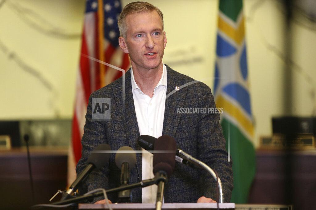 FILE - In this Aug. 30, 2020 file photo Portland Mayor Ted Wheeler speaks during a news conference. On Monday, Jan. 25, 2021, Wheeler said the ongoing criminal destruction and violence occurring in his city - which has been the epicenter of protests against racial injustice for eight months - is "unacceptable." (Sean Meagher/The Oregonian via AP, file)