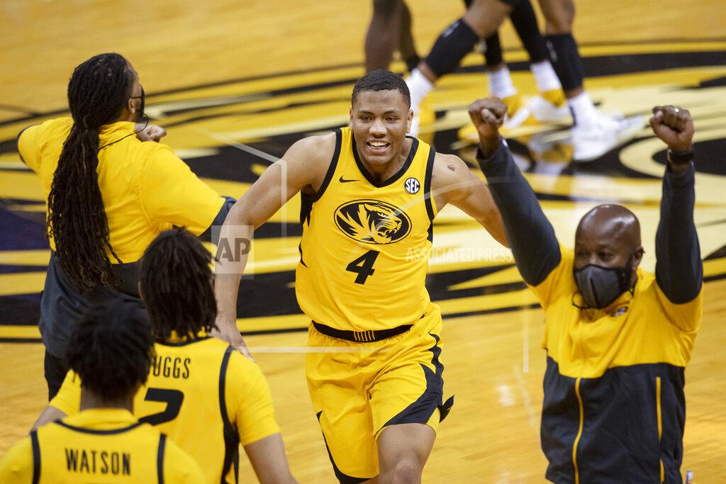 L.g. Patterson Missouri's Javon Pickett celebrates with teammates after Missouri defeated Illinois 81-78 in an NCAA college basketball game Saturday, Dec. 12, 2020, in Columbia, Mo. (AP Photo/L.G. Patterson)