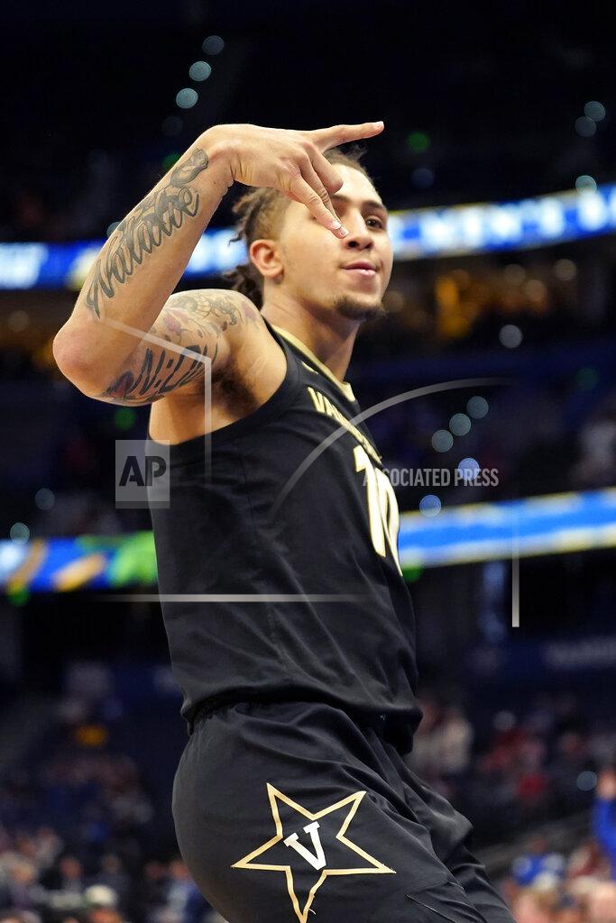 Chris O'meara Vanderbilt forward Myles Stute (10) celebrates a 3-point basket during the second half of an NCAA men's college basketball Southeastern Conference tournament game against Alabama, Thursday, March 10, 2022, in Tampa, Fla. (AP Photo/Chris O'Meara)