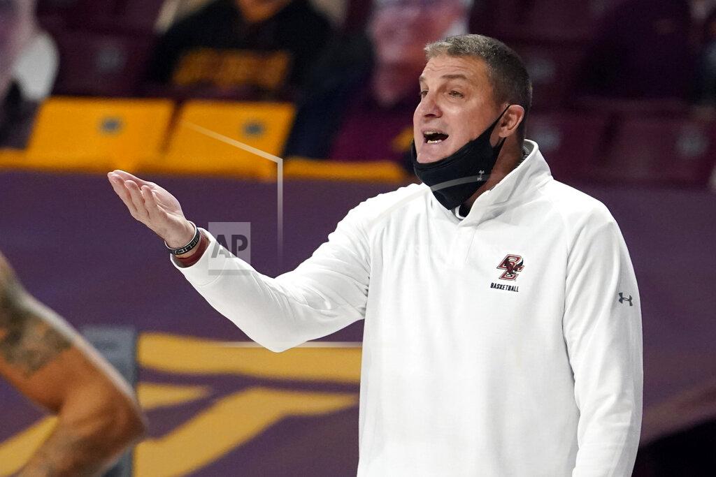 Jim Mone Boston College coach Jim Christian gestures during the first half of the team's NCAA college basketball game against Minnesota on Tuesday, Dec. 8, 2020, in Minneapolis. (AP Photo/Jim Mone)