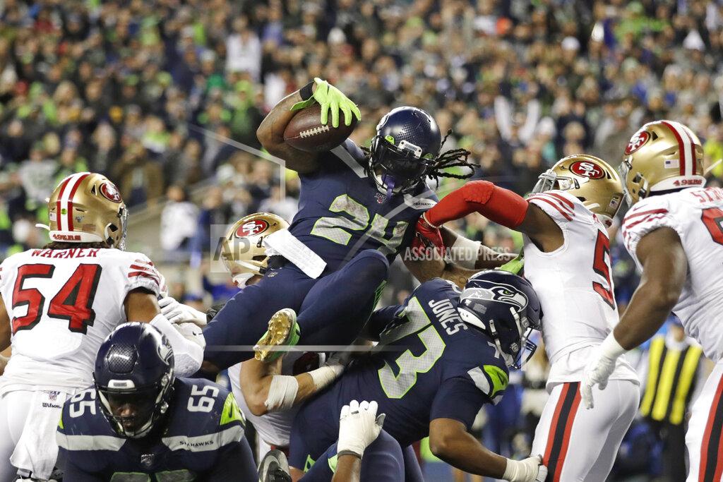 Stephen Brashear Seattle Seahawks' Marshawn Lynch (24) scores a touchdown on a 1-yard rush against the San Francisco 49ers during the second half of an NFL football game, Sunday, Dec. 29, 2019, in Seattle. (AP Photo/Stephen Brashear)