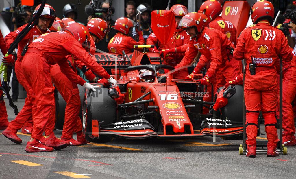 Yann Coatsaliou Technicians push the car of Ferrari's Monegasque driver Charles Leclerc in the pits during the Monaco Formula One Grand Prix race, at the Monaco racetrack, in Monaco, Sunday, May 26, 2019. (Yann Coatsaliou/Pool Photo via AP)