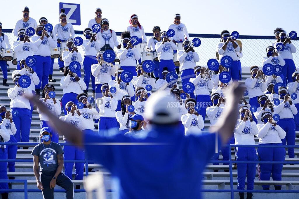 Mark Humphrey The Tennessee State marching band performs from the stands during the team's NCAA college football game against Southeast Missouri State on Sunday, April 11, 2021, in Nashville, Tenn. Because of COVID-19, the OVC postponed the 2020 season to the spring, and the decision was made to play games on Sunday because member schools needed flexibility to staff all the spring sports. (AP Photo/Mark Humphrey)