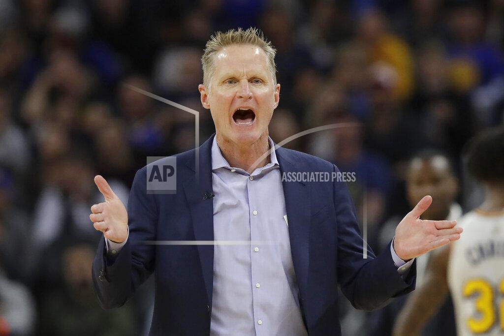 Jeff Chiu FILE - Golden State Warriors head coach Steve Kerr gestures toward an official during the first half of his team's NBA basketball game against the Toronto Raptors in San Francisco, in this Thursday, March 5, 2020, file photo. Don’t press Steve Kerr about last season. He would rather put it completely out of memory and move on for good from a last-place NBA finish and no playoffs following five straight trips to the NBA Finals. (AP Photo/Jeff Chiu, File)