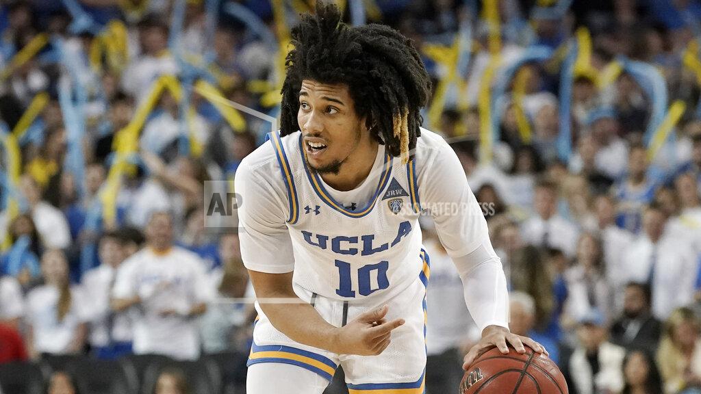 Chris Carlson FILE - In this Saturday, Feb. 29, 2020, file photo, UCLA guard Tyger Campbell brings the ball down court during the second half of an NCAA college basketball game against Arizona in Los Angeles. The first-place Bruins own a half-game lead over Oregon and can clinch at least a share of the league crown with a victory at crosstown rival Southern California on Saturday, March 7, 2020. They haven't won the regular-season title since 2012-13. (AP Photo/Chris Carlson, File)