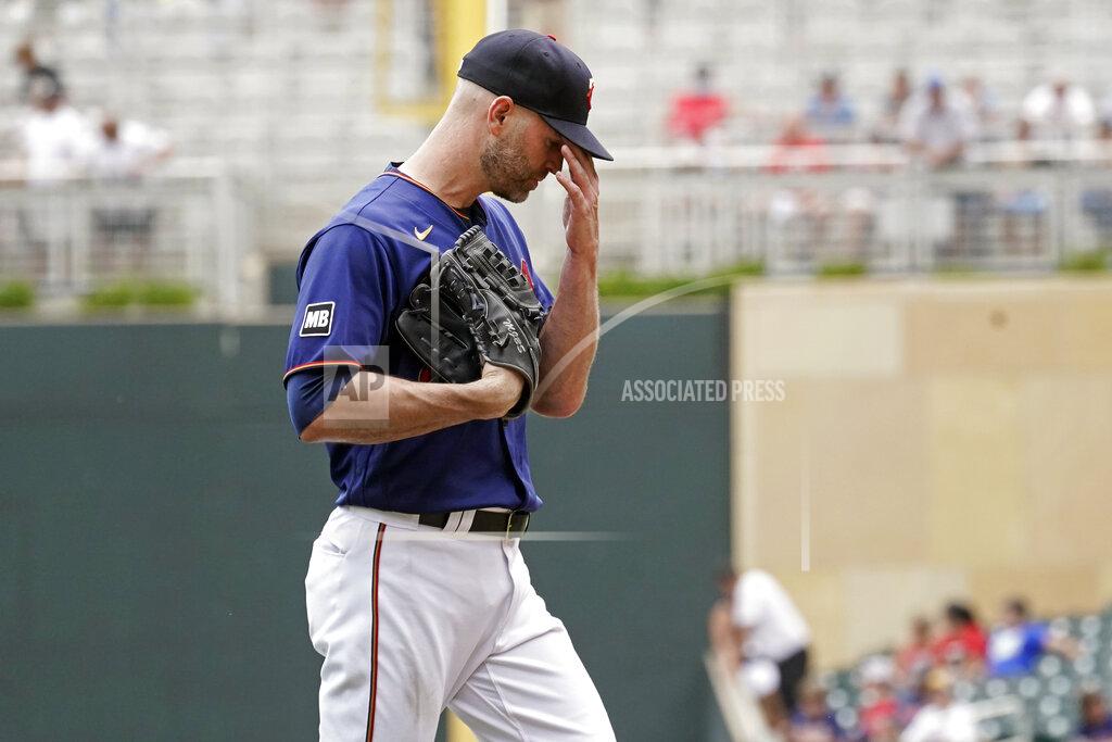 Jim Mone Minnesota Twins pitcher J.A. Happ heads to the dugout after he was pulled in the fourth inning of a baseball game against the Detroit Tigers, Wednesday, July 28, 2021, in Minneapolis. (AP Photo/Jim Mone)