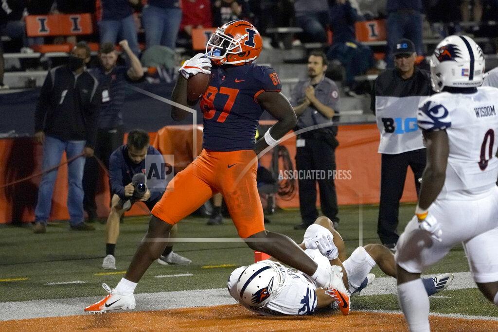 Charles Rex Arbogast Illinois tight end Daniel Barker celebrates his touchdown reception during the second half of an NCAA college football game against UTSA, Saturday, Sept. 4, 2021, in Champaign, Ill. (AP Photo/Charles Rex Arbogast)