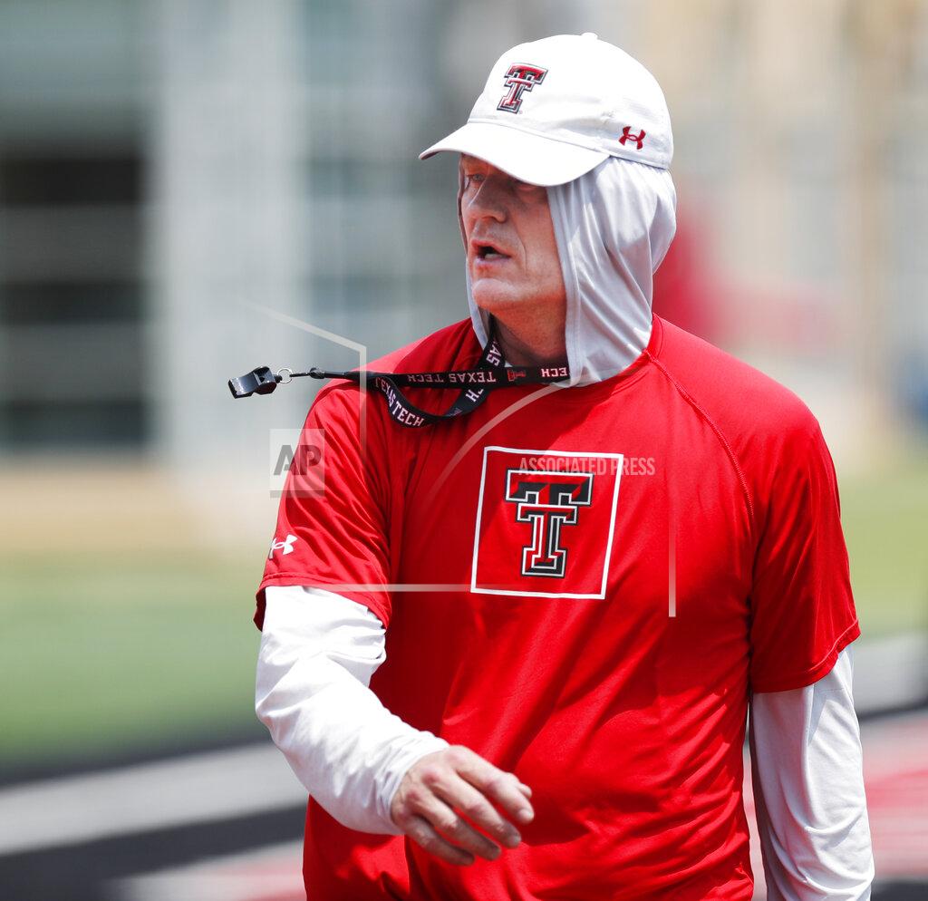 Justin Rex Texas Tech offensive coordinator Sonny Cumbie coaches during the team's first preseason NCAA college football football practice Friday, Aug. 6, 2021. Cumbie will make his debut as interim coach Saturday, Oct. 30, 2021, following the firing of coach Matt Wells. (Justin Rex/Lubbock Avalanche-Journal via AP)