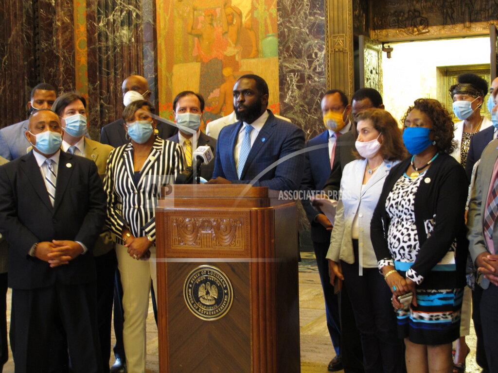 Melinda Deslatte Rep. Ted James, D-Baton Rouge, speaks about the Louisiana legislative session while surrounded by members of the House Democratic Caucus, on Monday, June 29, 2020, in Baton Rouge, La. (AP Photo/Melinda Deslatte)
