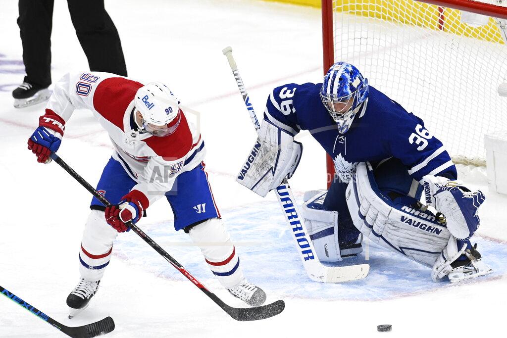 Frank Gunn Toronto Maple Leafs goaltender Jack Campbell (36) watches the puck as Montreal Canadiens left wing Tomas Tatar (90) looks for a rebound during the third period in Game 5 of an NHL hockey Stanley Cup first-round playoff series in Toronto on Thursday, May 27, 2021. (Frank Gunn/The Canadian Press via AP)