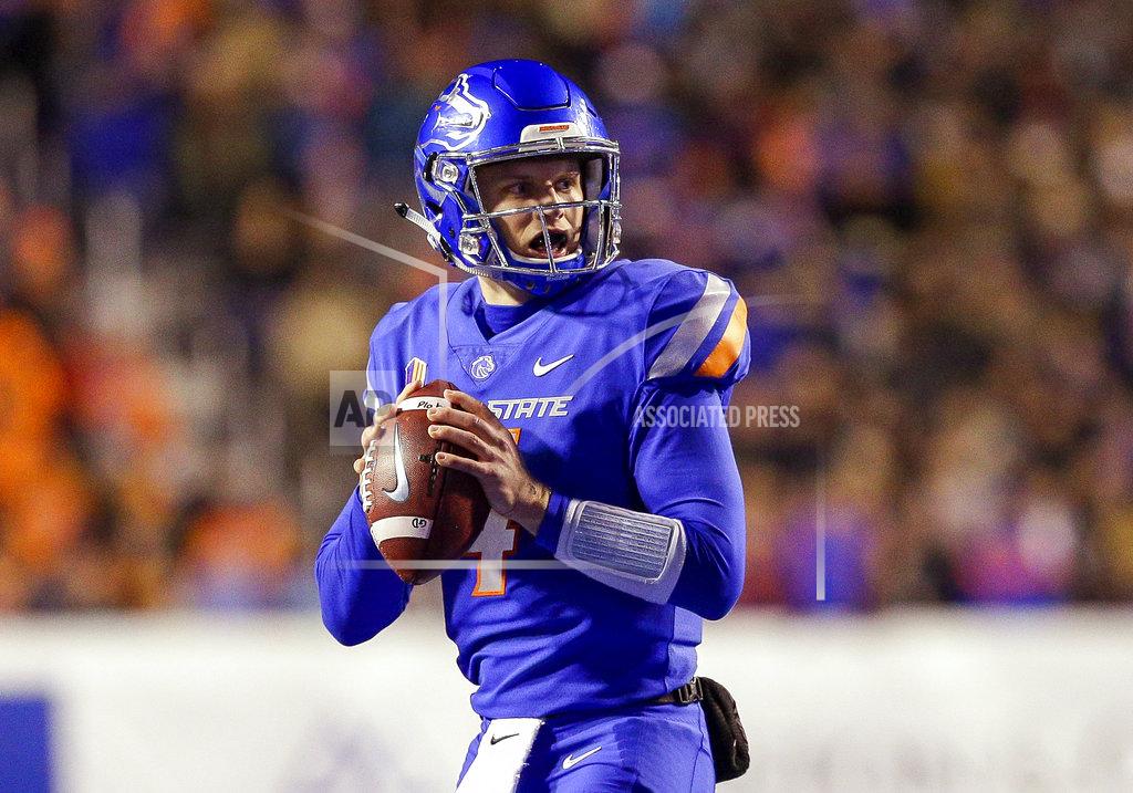 Steve Conner Boise State quarterback Brett Rypien looks for a receiver during the first half of the team's NCAA college football game against Utah State on Saturday, Nov. 24, 2018, in Boise, Idaho. (AP Photo/Steve Conner)