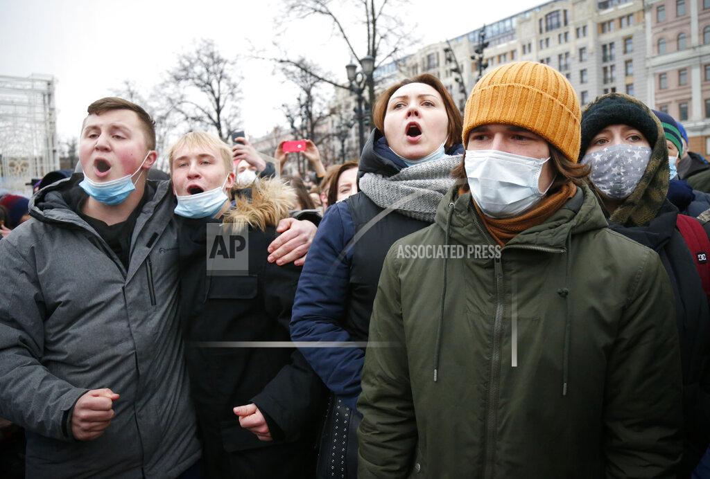 Alexander Zemlianichenko People protest against the jailing of opposition leader Alexei Navalny in Moscow, Russia, Saturday, Jan. 23, 2021. Russian police on Saturday arrested hundreds of protesters who took to the streets in temperatures as low as minus-50 C (minus-58 F) to demand the release of Alexei Navalny, the country's top opposition figure. A Navalny, President Vladimir Putin's most prominent foe, was arrested on Jan. 17 when he returned to Moscow from Germany, where he had spent five months recovering from a severe nerve-agent poisoning that he blames on the Kremlin. (AP Photo/Alexander Zemlianichenko)