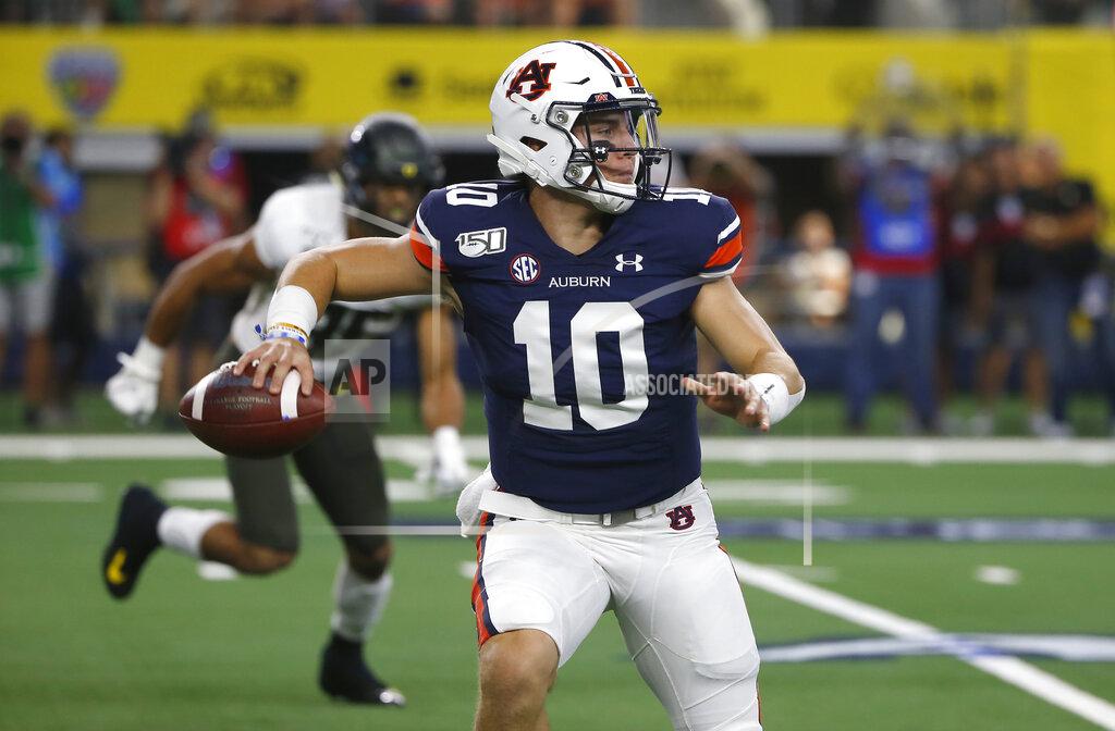 Ron Jenkins Auburn quarterback Bo Nix (10) throws downfield against Oregon during the first half of an NCAA college football game, Saturday, Aug. 31, 2019, in Arlington, Texas. (AP Photo/Ron Jenkins)