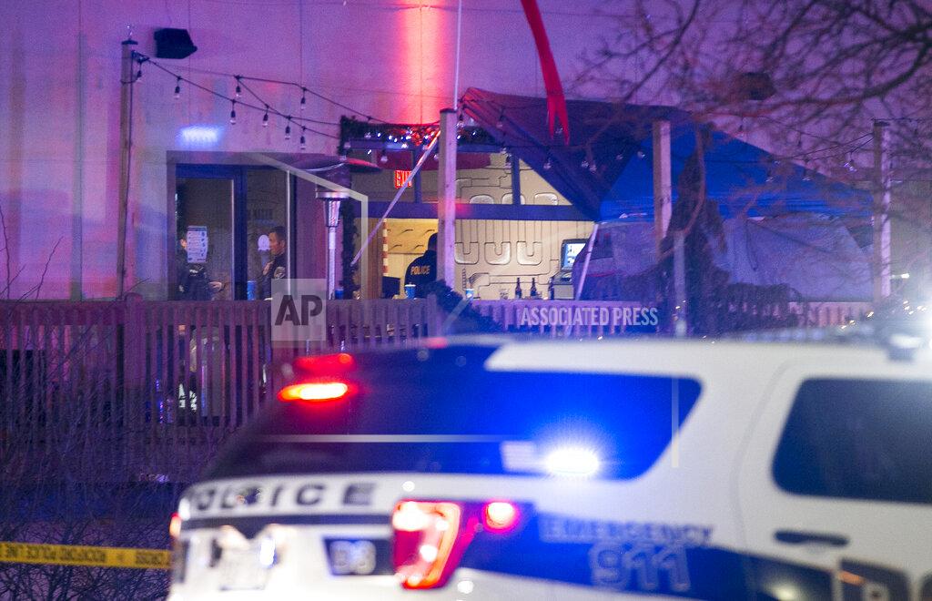 Scott P. Yates Rockford police work in the second-floor bar area after a shooting at a bowling alley Saturday, Dec. 26, 2020, in Rockford, Ill. (Scott P. Yates/Rockford Register Star via AP)