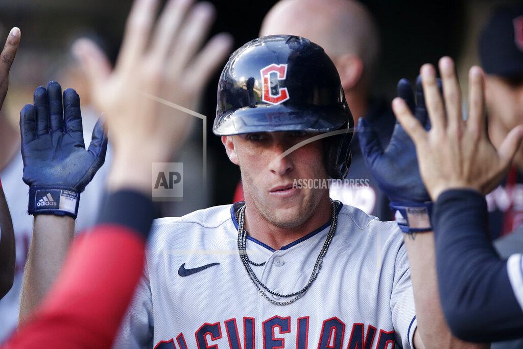 Andy Clayton-King Cleveland Guardians' Myles Straw is congratulated after scoring against the Minnesota Twins during the third inning of a baseball game Wednesday, June 22, 2022, in Minneapolis. (AP Photo/Andy Clayton-King)