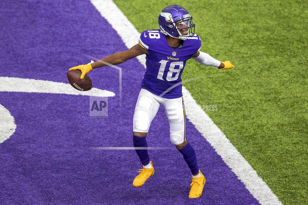 Elizabeth Flores Minnesota Vikings wide receiver Justin Jefferson celebrates after a 71-yard touchdown during the third quarter of an NFL football game against the Tennessee Titans, Sunday, Sept. 27, 2020 in Minneapolis. (Elizabeth Flores/Star Tribune via AP)