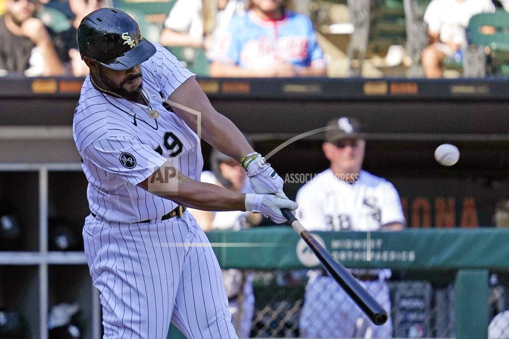 Nam Y. Huh Chicago White Sox's Jose Abreu hits a sacrifice fly during the seventh inning of a baseball game against the Los Angeles Angels in Chicago, Thursday, Sept. 16, 2021. (AP Photo/Nam Y. Huh)