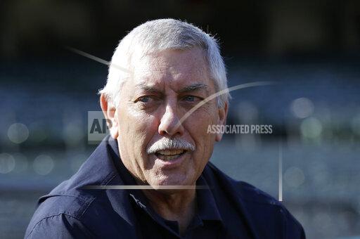 FILE - In this May 26, 2015, file photo, Oakland Athletics broadcaster and former catcher Ray Fosse is interviewed before a baseball game between the Athletics and the Detroit Tigers in Oakland, Calif. Fosse, the strong-armed catcher whose career was upended when he was bowled over by Pete Rose at the 1970 All-Star Game, has died. He was 74. Carol Fosse, his wife of 51 years, said in a statement Fosse died Wednesday, Oct. 13, 2021, after a 16-year bout with cancer. (AP Photo/Jeff Chiu, File)