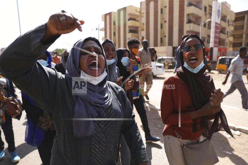 Marwan Ali Protesters gather in Khartoum, Sudan, Saturday, Dec. 19, 2020. Protests in Sudan’s capital and across the country are demanding a faster pace to democratic reforms, in demonstrations that are marking the two-year anniversary of the uprising that led to the military’s ouster of strongman Omar al-Bashir.(AP Photo/Marwan Ali)
