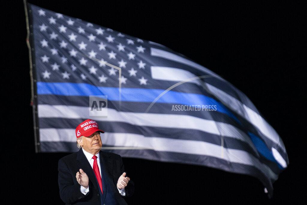 Alex Brandon President Donald Trump arrives to speak during a campaign rally at Southern Wisconsin Regional Airport, Saturday, Oct. 17, 2020, in Janesville, Wis. (AP Photo/Alex Brandon)