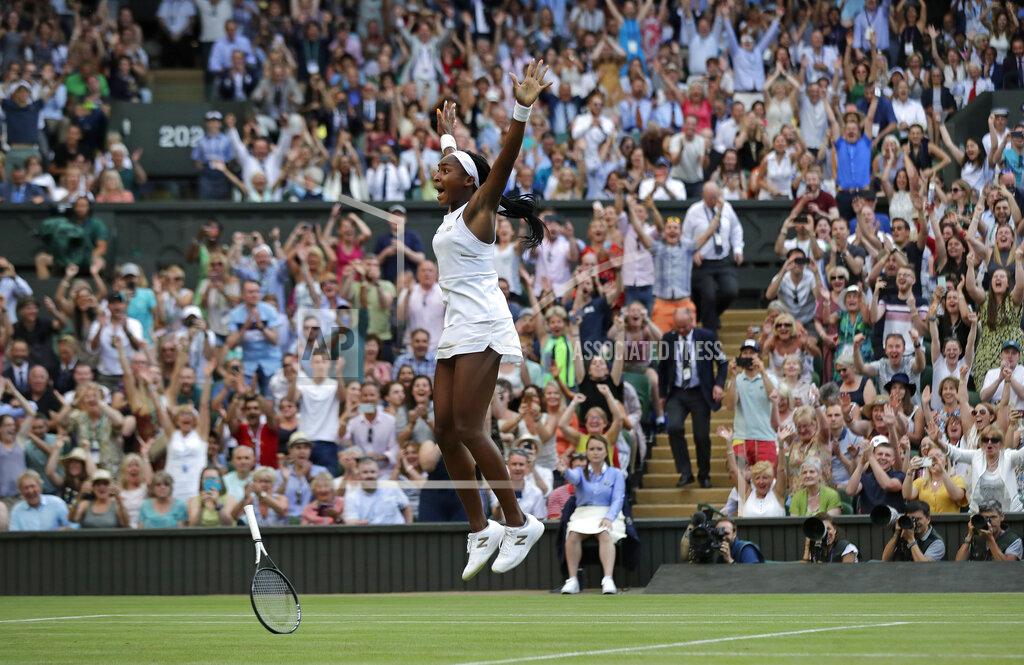 File-This July 5, 2019 file photo shows United States' Cori "Coco" Gauff celebrating after beating Slovenia's Polona Hercog in a Women's singles match during day five of the Wimbledon Tennis Championships in London. Wimbledon’s next and from afar, Comes Coco Gauff, uncharted star. (AP Photo/Ben Curtis, File)