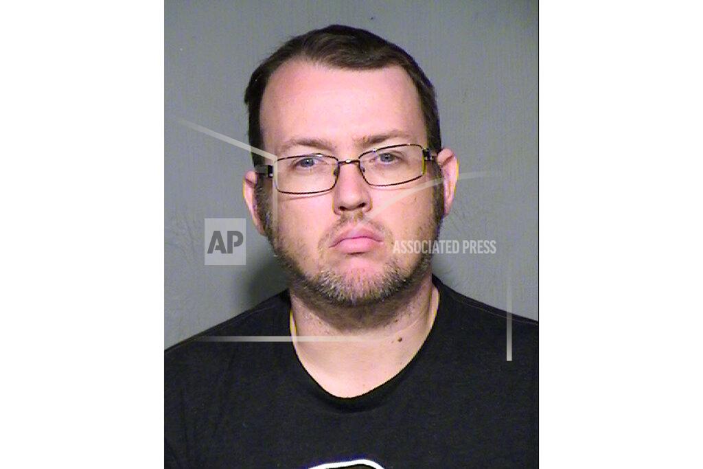 Uncredited FILE - This undated booking photo provided by the Maricopa County Sheriff's Office shows Bryan Patrick Miller, who faces murder and other charges in the stabbing deaths of two young women in northwest Phoenix in the early 1990s. His attorney said on Wednesday, July 21, 2021, that he intends on mounting an insanity defense on Miller's behalf. Miller has pleaded not guilty to the charges. (Maricopa County Sheriff's Office via AP)