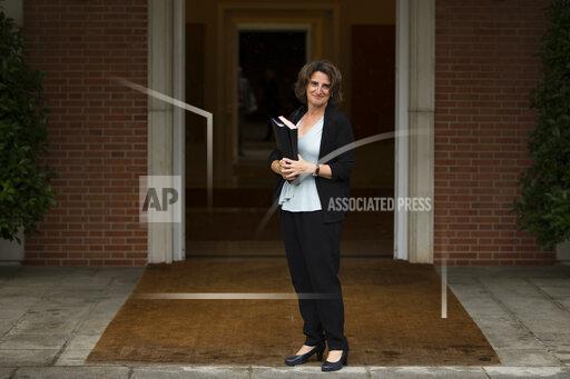FILE - In this Friday, June 8, 2018 file photo, Spain's then Energy and Environment Minister Teresa Ribera poses for the media at the Moncloa palace in Madrid. Spain has sent another member of its government to Algeria to seek guarantees that its supply of natural gas won't be impacted when Algeria closes its pipeline through Morocco on Sunday. Spanish Deputy Prime Minister Teresa Ribera said on Wednesday, Oct. 27, 2021 that she has secured a renewed pledge by Algeria that its commitments to supply natural gas will be met via a second pipeline that crosses the Mediterranean directly.(AP Photo/Francisco Seco, file)
