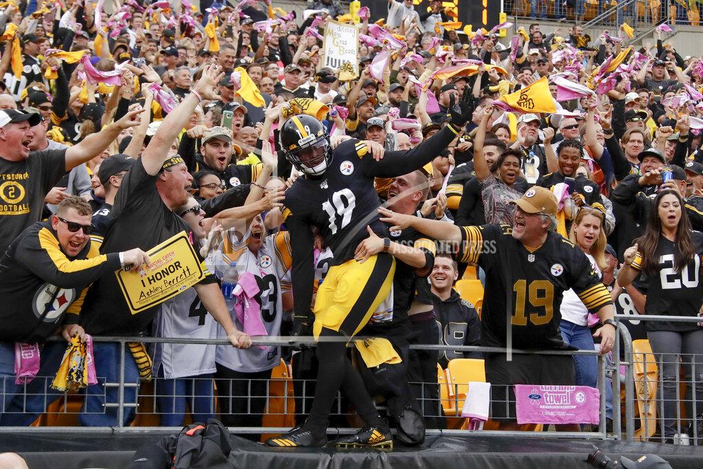 Don Wright Pittsburgh Steelers wide receiver JuJu Smith-Schuster (19) celebrates with fans after scoring a touchdown in the first half of an NFL football game against the Baltimore Ravens, Sunday, Oct. 6, 2019, in Pittsburgh. (AP Photo/Don Wright)