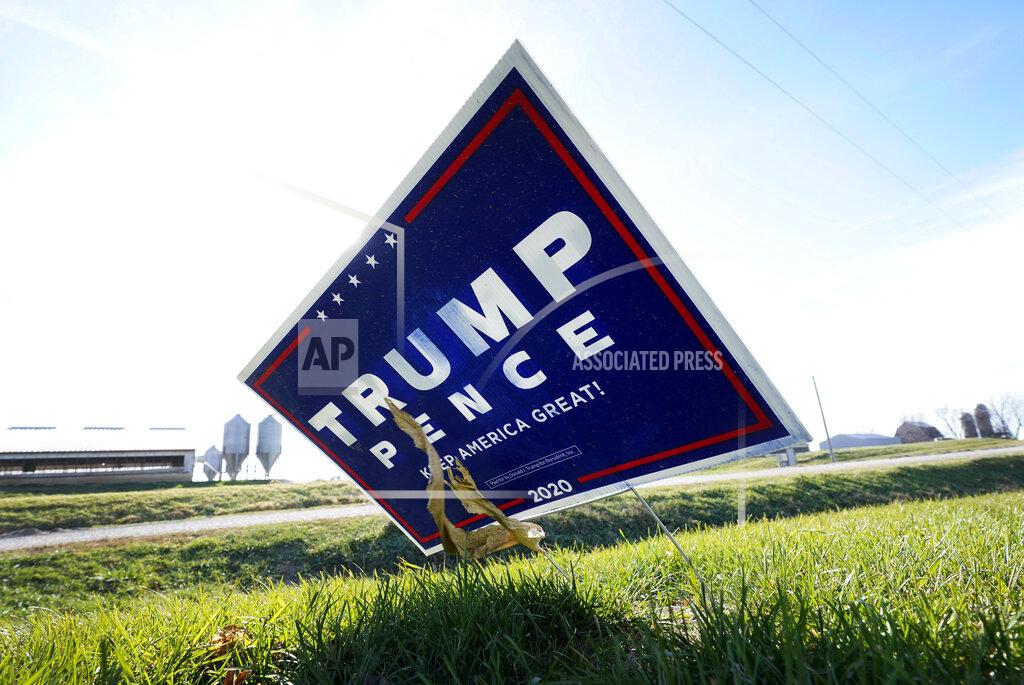 Charlie Neibergall A sign in support of President Donald Trump is seen in the yard of Jasper County Republican Party chairman Thad Nearmyer, Thursday, Nov. 19, 2020, near Monroe, Iowa. "It's the Trump factor," Nearmyer said about how Democrats lost House seats. "People were super excited to vote for the president." (AP Photo/Charlie Neibergall)