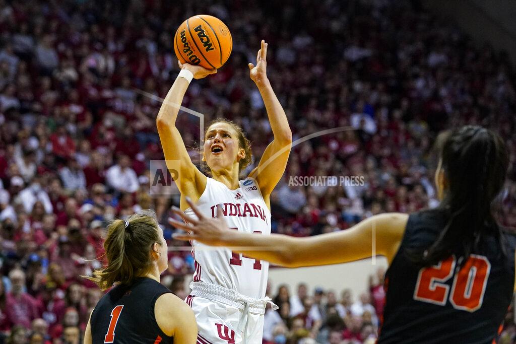 Michael Conroy Indiana guard Ali Patberg (14) shoots over Princeton guard Abby Meyers (1) in the second half of a college basketball game in the second round of the NCAA tournament in Bloomington, Ind., Monday, March 21, 2022. Indiana defeated Princeton 56-55. (AP Photo/Michael Conroy)