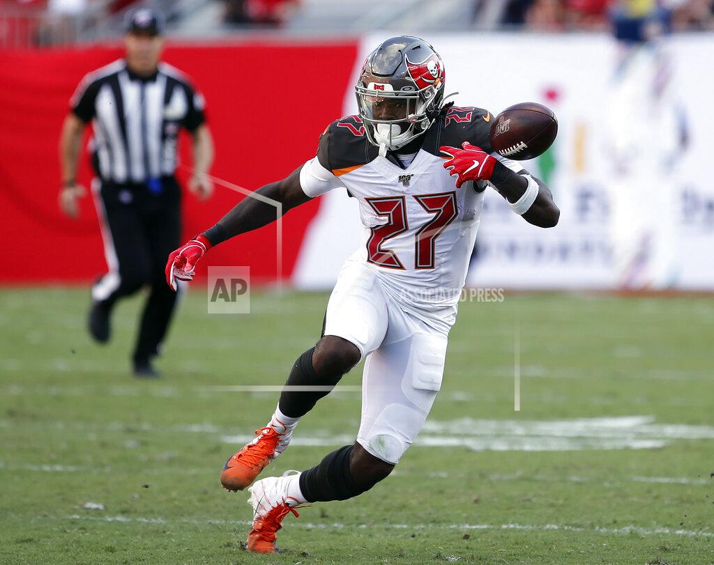 Mark Lomoglio Tampa Bay Buccaneers running back Ronald Jones II (27) fumbles the football on a run against the Arizona Cardinals during the second half of an NFL football game Sunday, Nov. 10, 2019, in Tampa, Fla. (AP Photo/Mark LoMoglio)