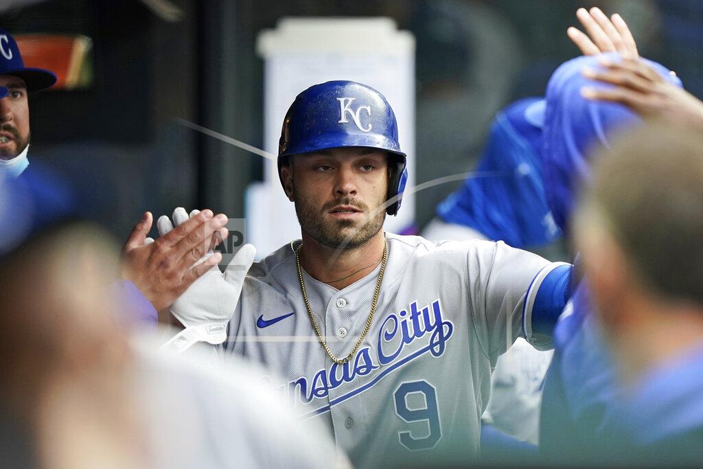 Tony Dejak Kansas City Royals' Ryan McBroom is congratulated by teammates after scoring in the seventh inning of a baseball game against the Cleveland Indians, Monday, April 5, 2021, in Cleveland. (AP Photo/Tony Dejak)