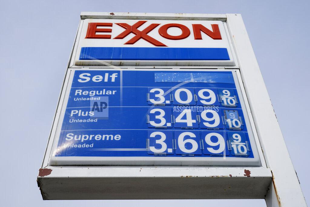 Shown is an Exxon service station sign in Philadelphia, Wednesday, April 28, 2021. Exxon Mobil reported profits of $2.73 billion in the first quarter, after a tumultuous year led to major spending reductions. The The Irving, Texas company produced 3.8 million barrels of oil per day in the first quarter, up 3% from the fourth quarter of 2020. (AP Photo/Matt Rourke)