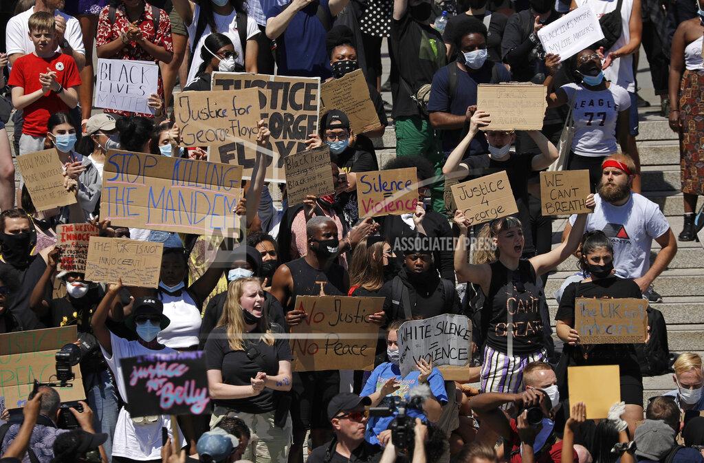 Matt Dunham People gather in Trafalgar Square in central London on Sunday, May 31, 2020 to protest against the recent killing of George Floyd by police officers in Minneapolis that has led to protests across the US. (AP Photo/Matt Dunham)