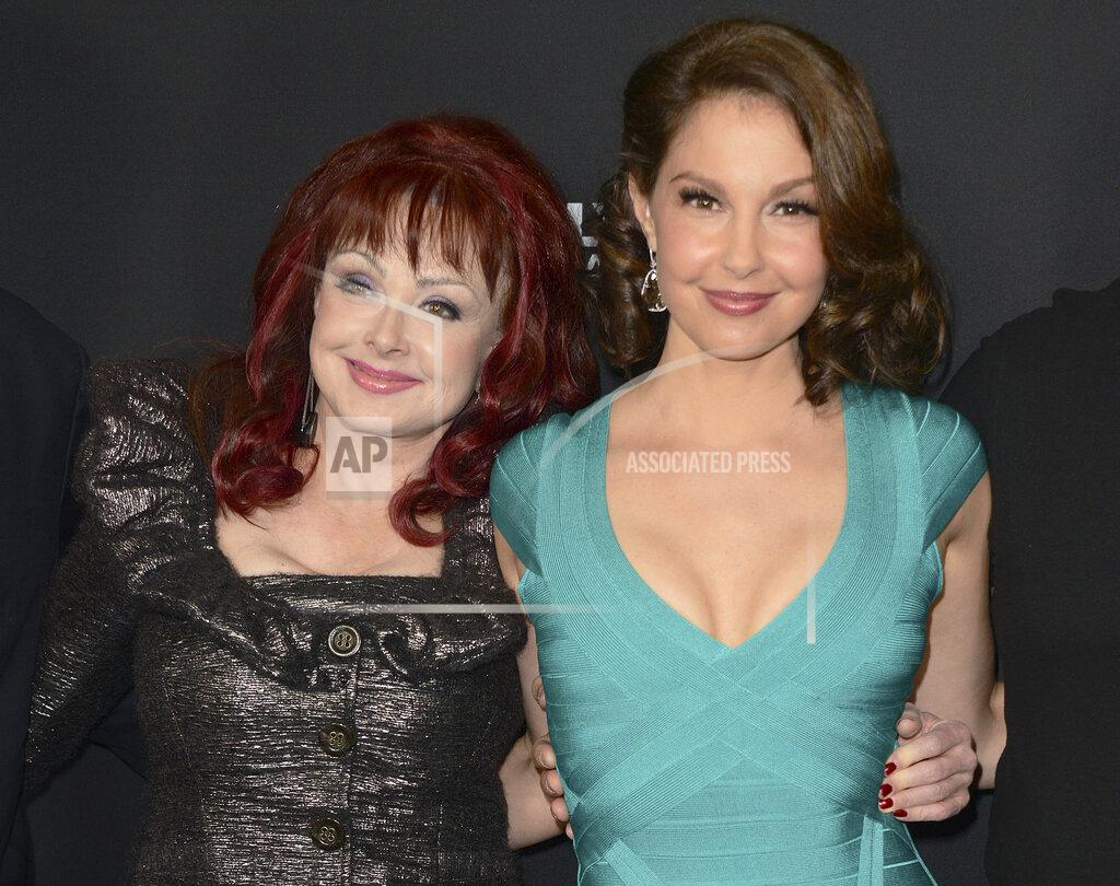 Jordan Strauss FILE - Naomi Judd, left, and Ashley Judd arrive at the LA premiere of "Olympus Has Fallen" in Los Angeles on March 18, 2013. Ashley Judd encouraged people to seek help for their mental health after the loss of her mother, country star Naomi Judd, in an interview on “Good Morning America." Naomi Judd died at the age of 76 on April 30, 2022. (Photo by Jordan Strauss/Invision/AP, File)