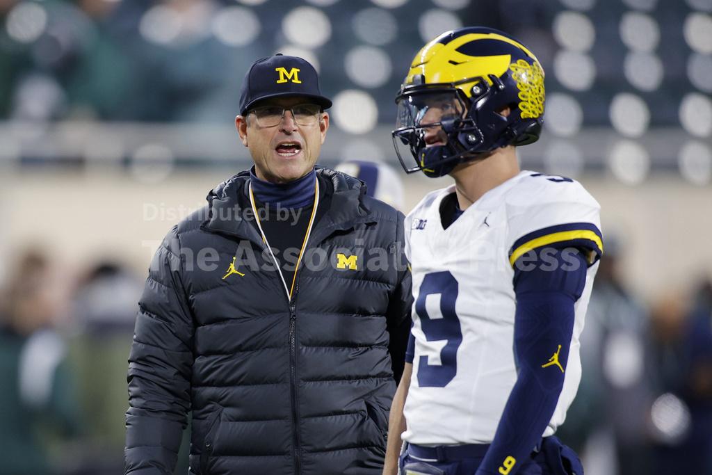 Coach Jim Harbaugh banned from 3 games over signstealing allegations