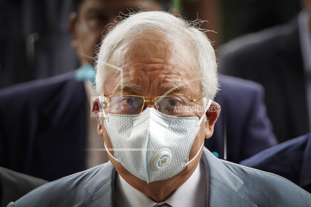 Vincent Thian Former Malaysian Prime Minister Najib Razak wearing a face mask arrives at court house in Kuala Lumpur, Malaysia, Thursday, June 4, 2020. Closing arguments are expected in the first corruption trial of him linked to the multibillion-dollar looting of the 1MDB state investment fund. (AP Photo/Vincent Thian)
