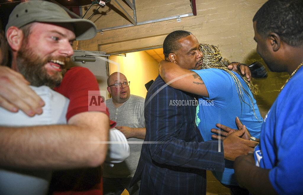 Steve Mellon An emotional state Rep. Ed Gaineym, center, is congratulated moments after learning he'd won the Democratic primary for Pittsburgh mayor, Tuesday, May 18, 2021. (Steve Mellon/Pittsburgh Post-Gazette via AP)