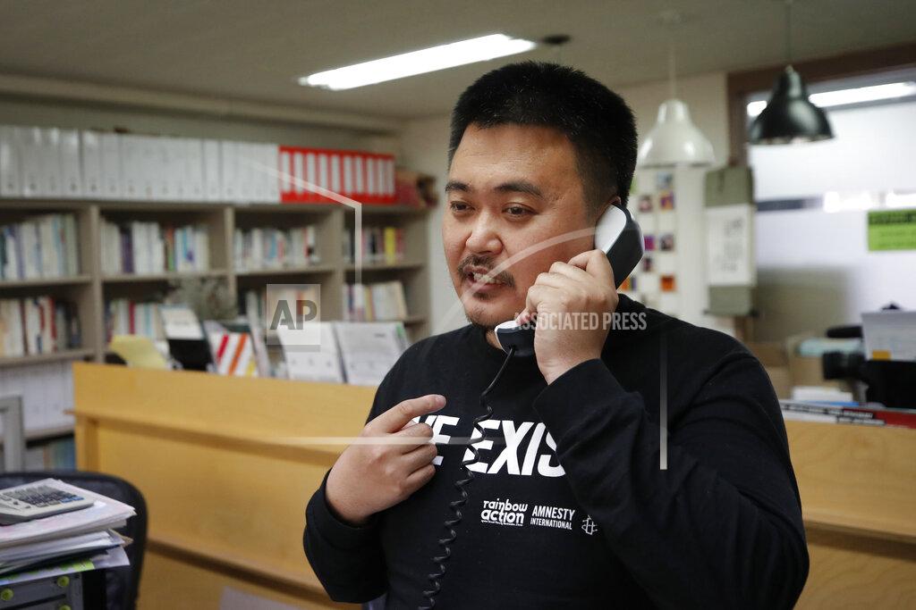 Lee Jin-Man In this May 11, 2020 photo, Lee Jong-geol, general director of the gay rights advocacy group Chingusai talks on the phone before an interview in Seoul, South Korea. As South Korea grapples with a new spike in coronavirus infections thought to be linked to nightspots in Seoul, including several popular with gay men, it's also seeing rising homophobia that's making it difficult for sexual minorities to come forward for diagnostic tests. (AP Photo/Lee Jin-man)