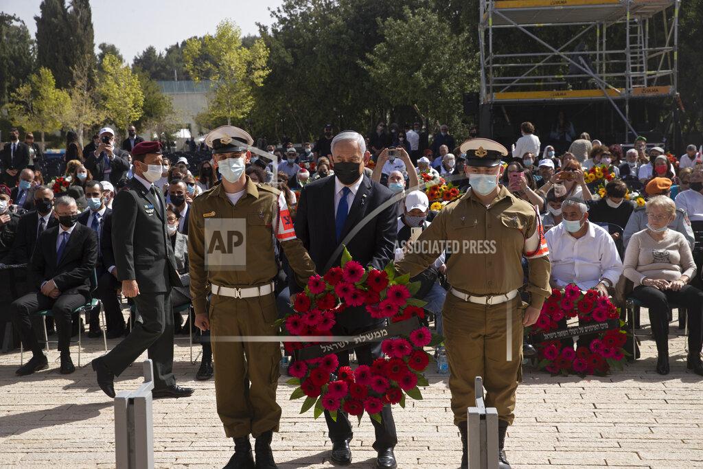 Maya Alleruzzo Israeli Prime Minister Benjamin Netanyahu prepares to lay a wreath at a ceremony marking the annual Holocaust Remembrance Day at Yad Vashem Holocaust Memorial in Jerusalem, Thursday, April 8, 2021. (AP Photo/Maya Alleruzzo, Pool)