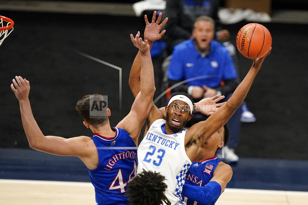 Darron Cummings FILE - In this Dec. 1, 2020, file photo, Kentucky's Isaiah Jackson (23) grabs a rebound next to Kansas' Mitch Lightfoot (44) during an NCAA college basketball game in Indianapolis. Jackson was selected in the first round of the NBA draft Thursday, July 29. (AP Photo/Darron Cummings, File)