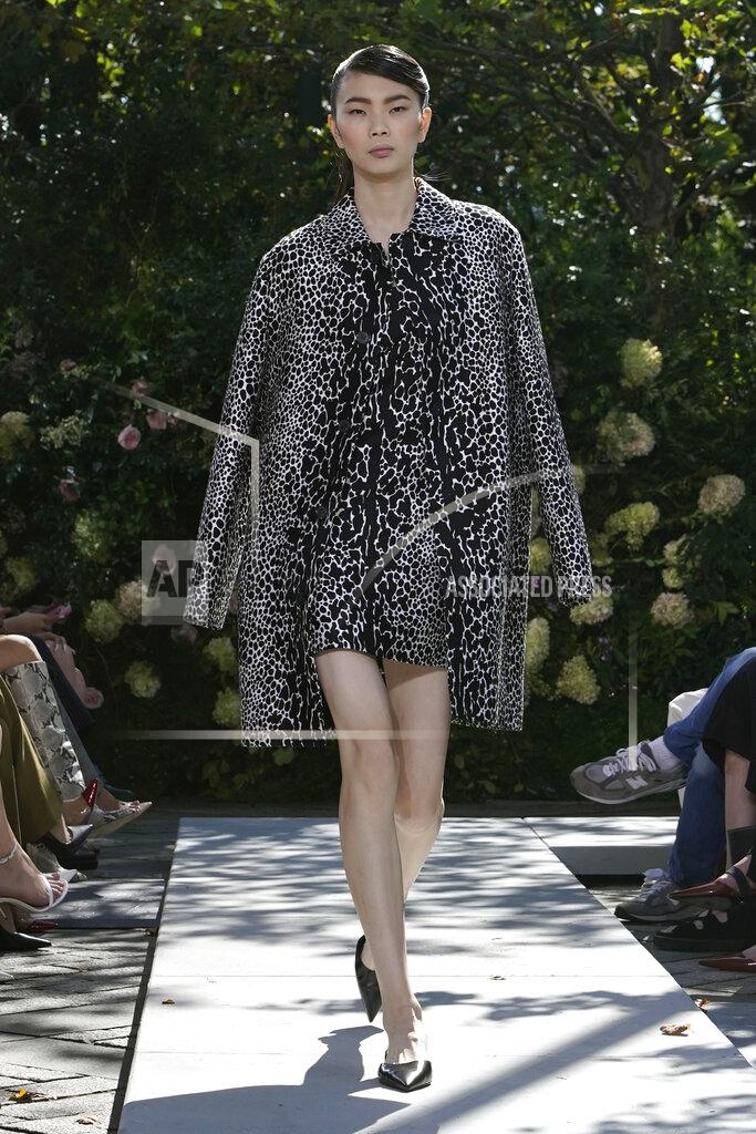 Richard Drew The Michael Kors Spring/Summer 2022 collection is modeled during Fashion Week, in New York, Friday, Sept. 10, 2021. (AP Photo/Richard Drew)