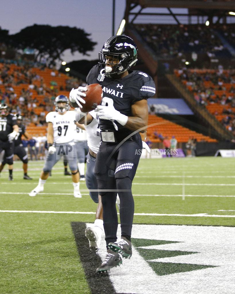 Marco Garcia Hawaii wide receiver Cedric Byrd (6) pulls in a touchdown against Nevada during the first half of an NCAA college football game Saturday, Oct. 20, 2018, in Honolulu. (AP Photo/Marco Garcia)