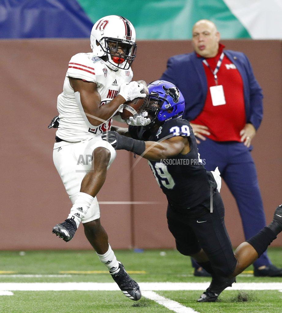 Carlos Osorio Northern Illinois wide receiver D.J. Brown (10), defended by Buffalo cornerback Cameron Lewis (39) catches a 8-yard pass for the go-ahead touchdown during the second half of the Mid-American Conference championship NCAA college football game, Friday, Nov. 30, 2018, in Detroit. (AP Photo/Carlos Osorio)