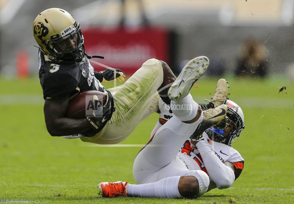 Jack Dempsey Colorado wide receiver K.D. Nixon (3) is tripped by Oregon State safety Jeffrey Manning Jr. (15) during the first half of an NCAA college football game, Saturday, Oct. 27, 2018, in Boulder, Colo. (AP Photo/Jack Dempsey)