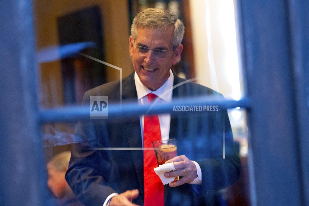 Ben Gray Incumbent Georgia Secretary of State Brad Raffensperger talks with supporters during an election night party Tuesday evening, May 24, 2022, at a small restaurant in Peachtree Corners, Ga. (AP Photo/Ben Gray)