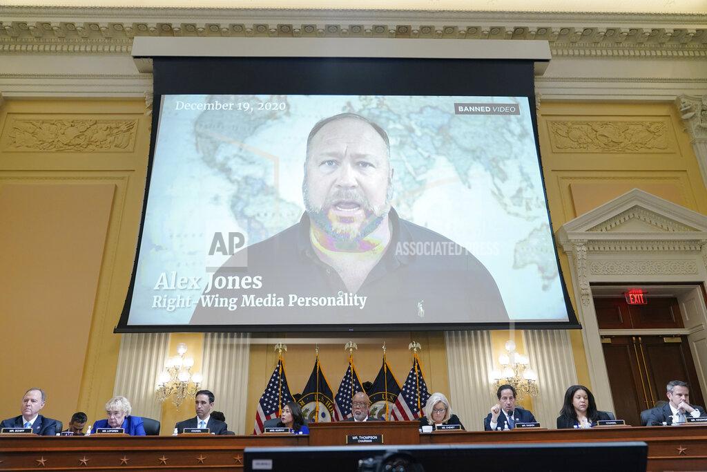 Jacquelyn Martin FILE - In this July 12, 2022 file photo, a video showing Alex Jones is shown as the House select committee investigating the Jan. 6 attack on the U.S. Capitol holds a hearing at the Capitol in Washington. An attorney representing two parents who sued Jones over his false claims about the Sandy Hook massacre says the U.S. House Jan. 6 committee has requested two years’ worth of records from Jones’ phone. Attorney Mark Bankston said in court Thursday, Aug. 4, 2022 that the committee investigating the attack on the U.S. Capitol has requested the digital records. (AP Photo/Jacquelyn Martin, File)