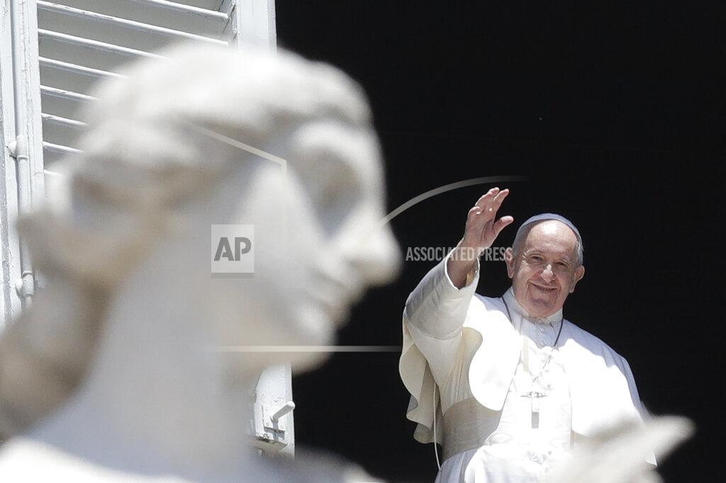 Andrew Medichini Pope Francis delivers his blessing from the window of his studio overlooking St. Peter's Square, at the Vatican, Sunday, May 24, 2020. For the first time in months, well-spaced faithful gathered in St. Peter’s Square for the traditional Sunday papal blessing, casting their gaze at the window where the pope normally addresses the faithful, since the square had been closed due to anti-coronavirus lockdown measures. (AP Photo/Andrew Medichini)