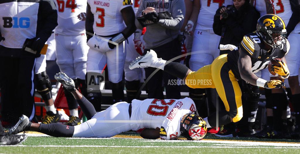 Charlie Neibergall Iowa running back Mekhi Sargent (10) is tackled by Maryland defensive back Antwaine Richardson during the first half of an NCAA college football game, Saturday, Oct. 20, 2018, in Iowa City, Iowa. (AP Photo/Charlie Neibergall)