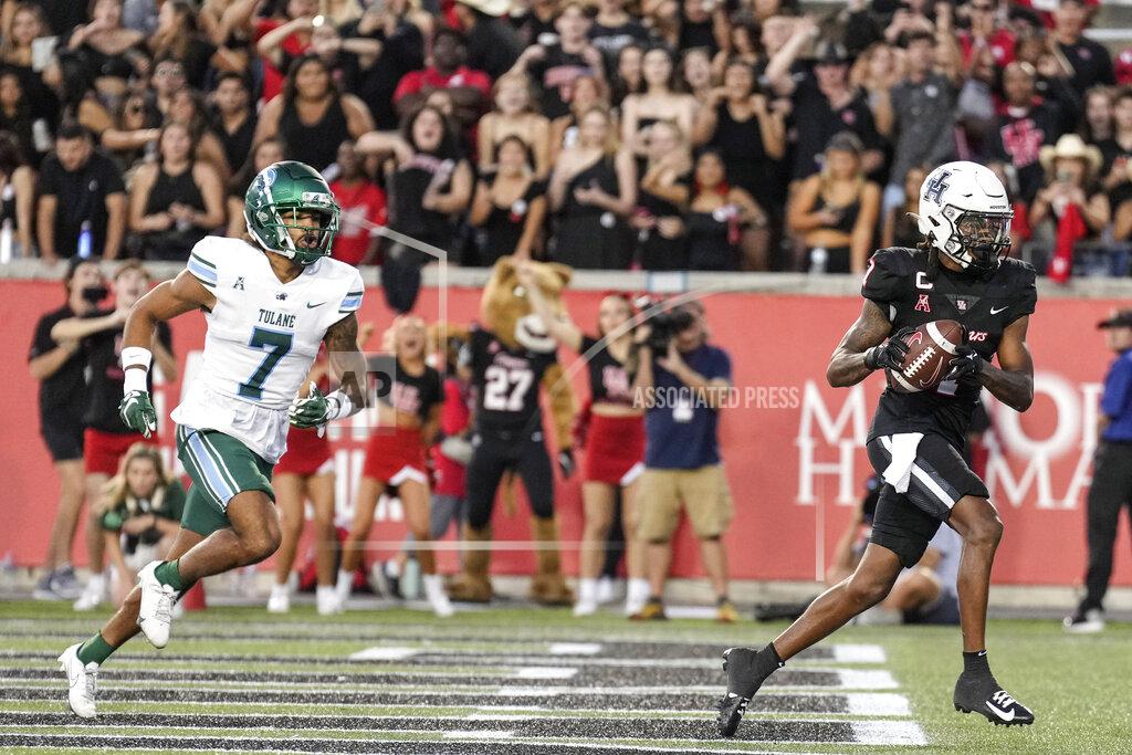 Brett Coomer Houston wide receiver Nathaniel Dell (1) beats Tulane defensive back Lance Robinson (7) for a 1-yard touchdown reception during the second quarter of an NCAA college football game Friday, Sept. 30, 2022, in Houston. (Brett Coomer/Houston Chronicle via AP)